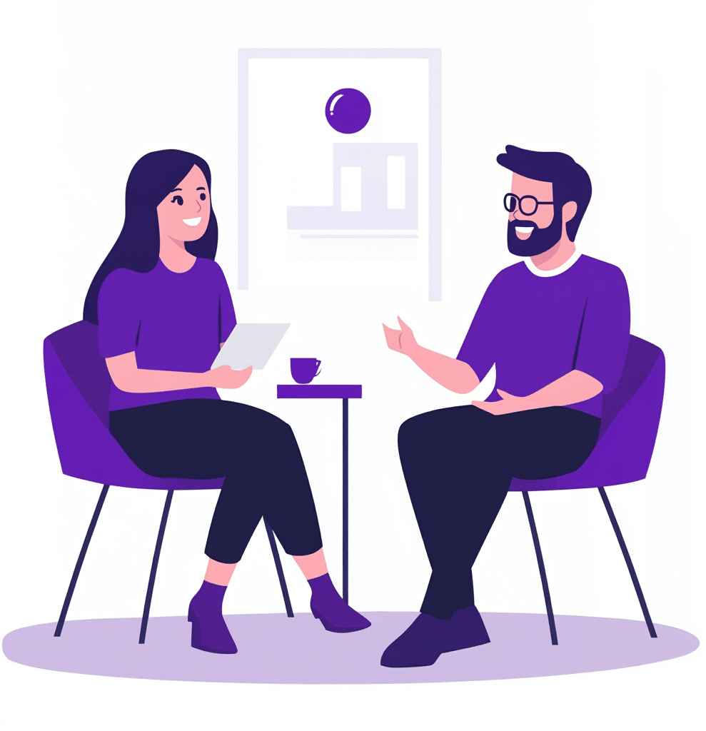 two people at a table conversing happily