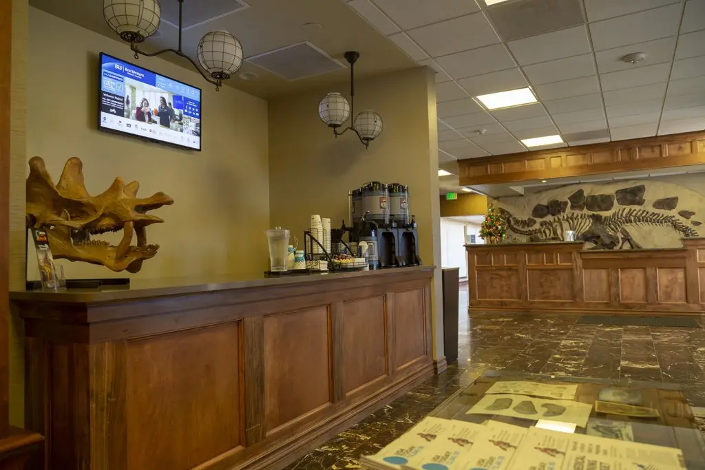 Interior of Hotel lobby with a digital sign hanging