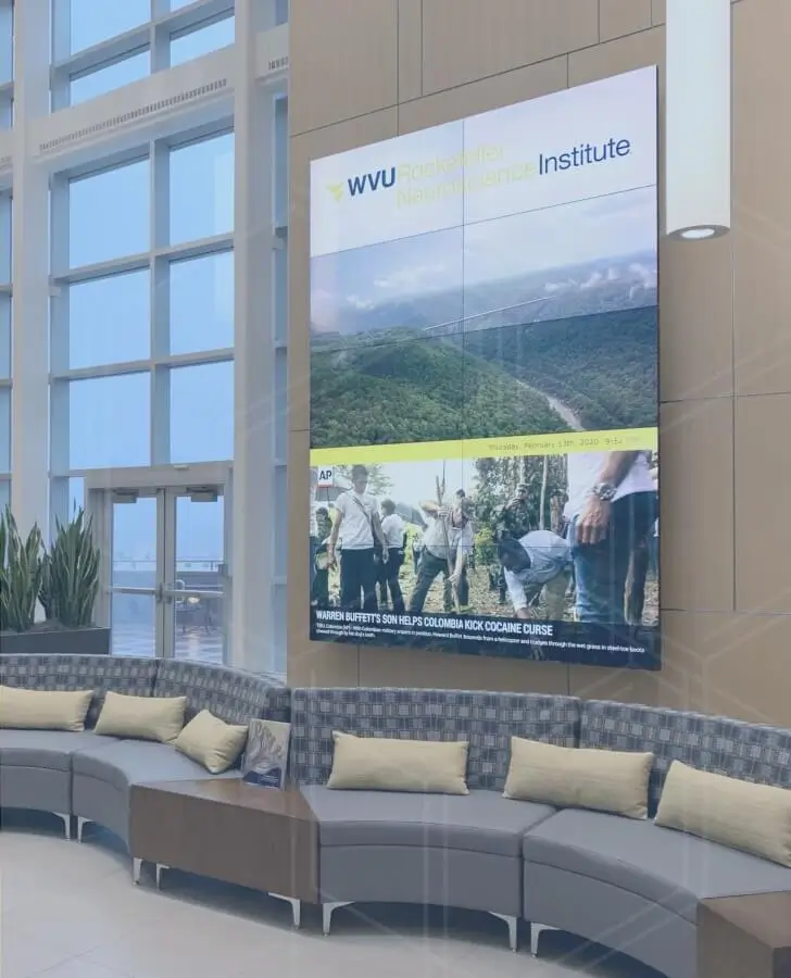 WVU Rockefeller Neuroscience Institute digital signage in a lobby