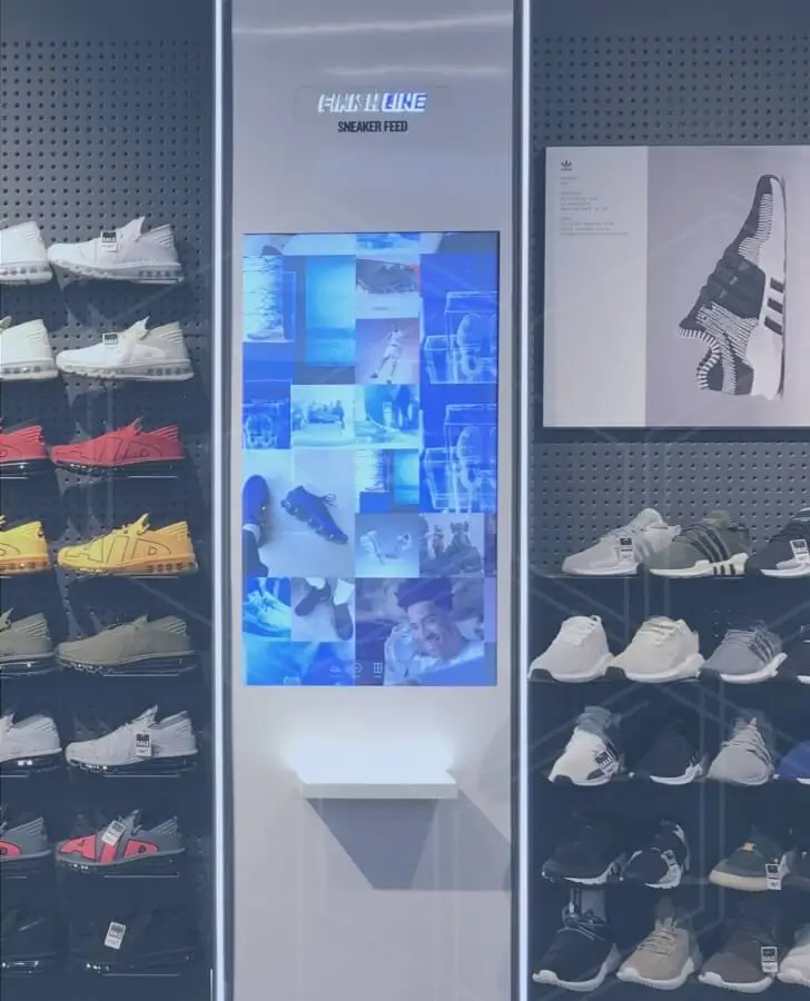 Finish Line Sneaker Feed digital signage in a retail store which was part of the Screenscape acquisition